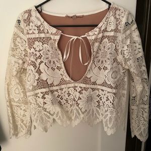 White cropped floral top with oval scoop with tie